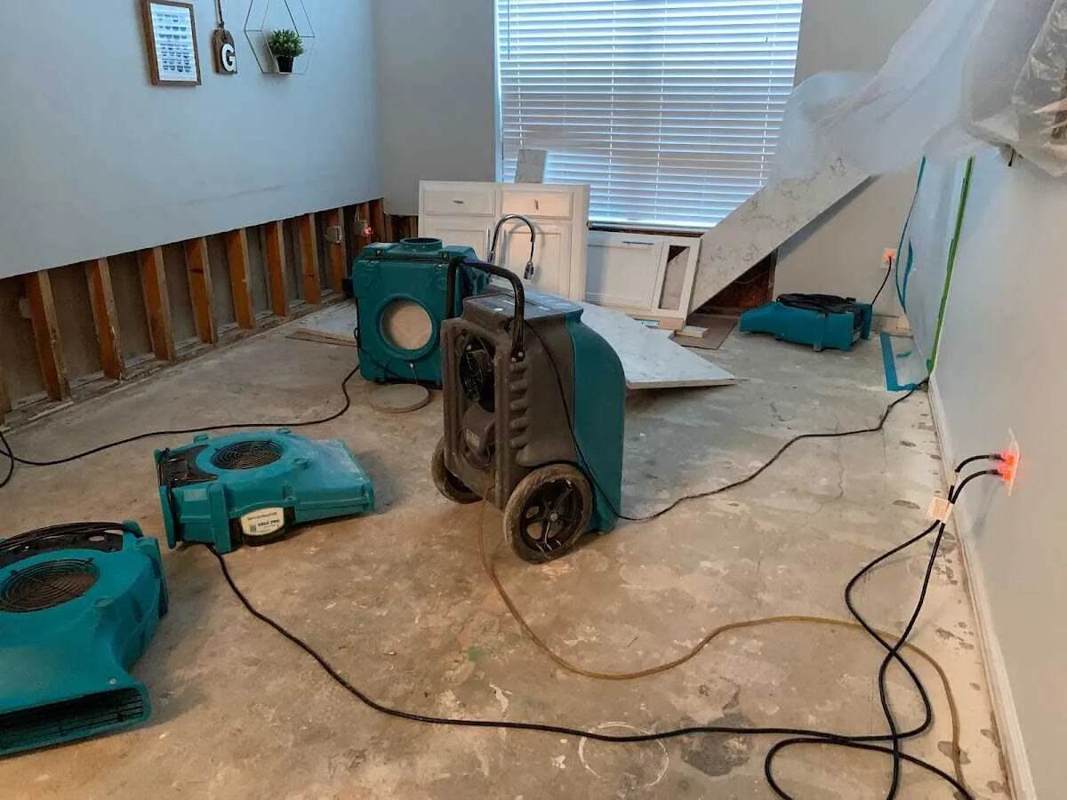 Dehumidifier in flood-cut room for Water Damage Restoration in Hilo